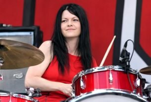 Meg White of The White Stripes, half of a 1990s-2000s rock duo with six Grammys